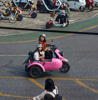 Girls in a rental scooter, Udo island near Jeju island
